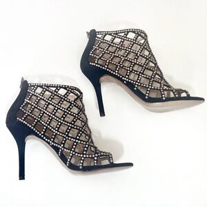 MICHAEL KORS: Sparkly, rhinestone, caged Yvonne bootie. Black size 7. 3.5" Heel.